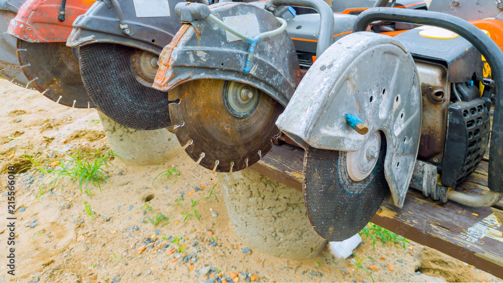 Fototapeta premium This diamond saw blade used on a concrete cutting machine has sharp teeth which makes clean cuts in concrete.