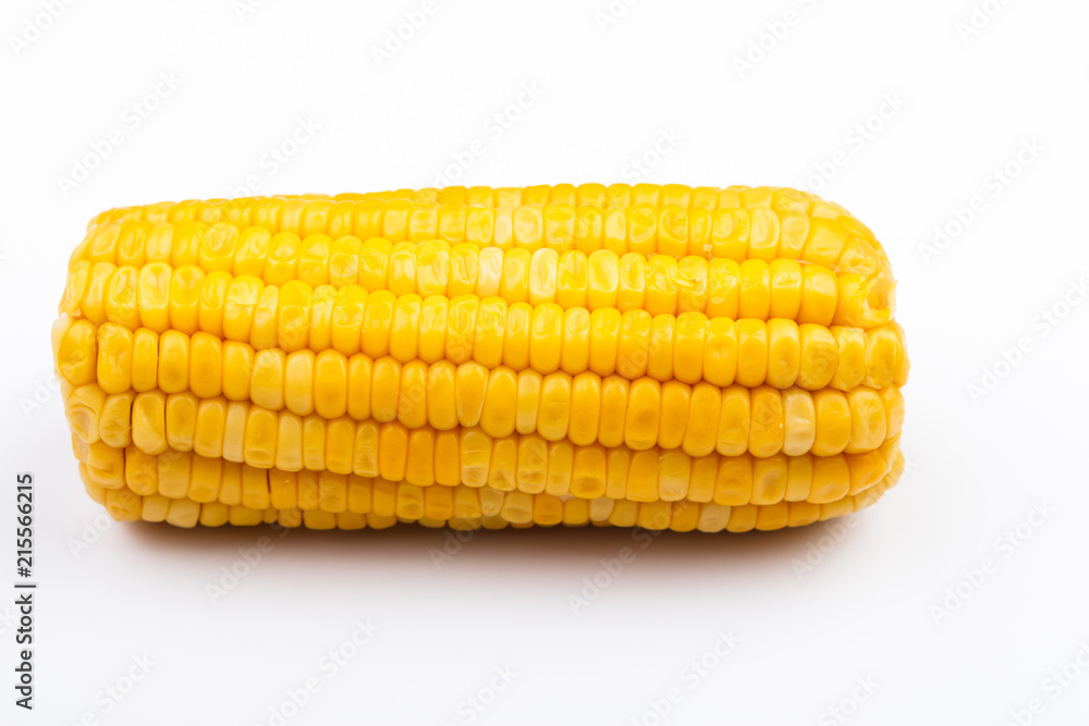 Boiled corn on white background. Isolate. Close-up Boiled corn on white background. Isolate. Close-up