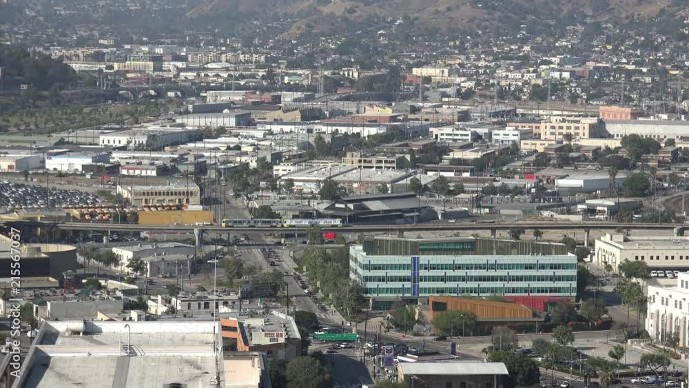 Aerial view of Los Angeles with a commuter train passing Aerial view of Los Angeles with a commuter train passing