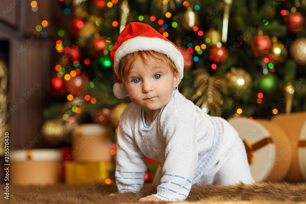 Little boy near christmas tree Little boy near christmas tree