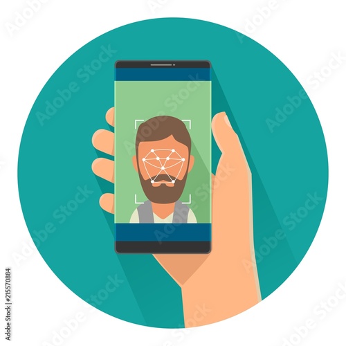 Male holding smartphone with laser scan ID face on screen.