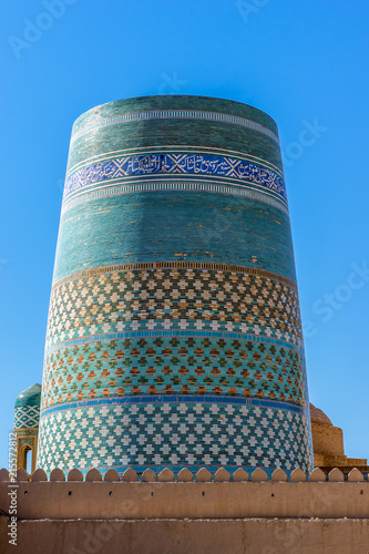 Unfinished turquoise-tiled Kalta Minor Minaret at Ichan Qala - Khiva, Uzbekistan