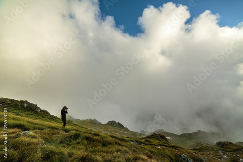 Photographer shooting landscape photos