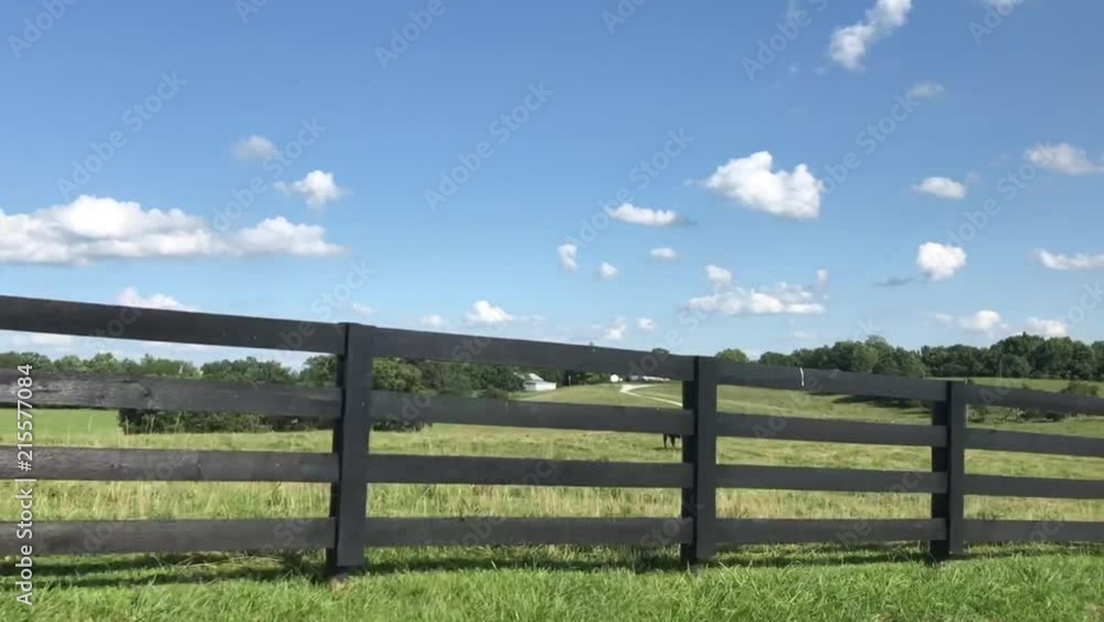 Driving through the country passing a beautiful farm Driving through the country passing a beautiful farm