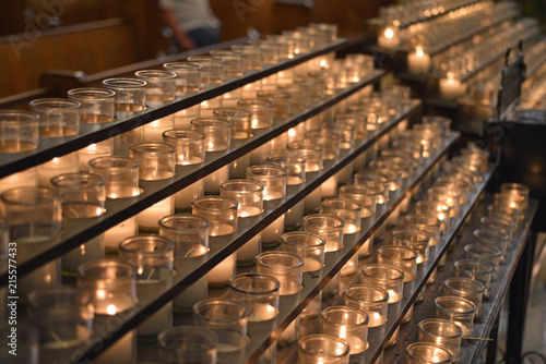 Votive candles flickering in Louisiana church