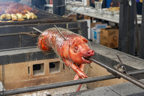 BBQ hog on spit pig barbeque 