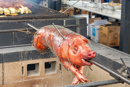 BBQ hog on spit pig barbeque 