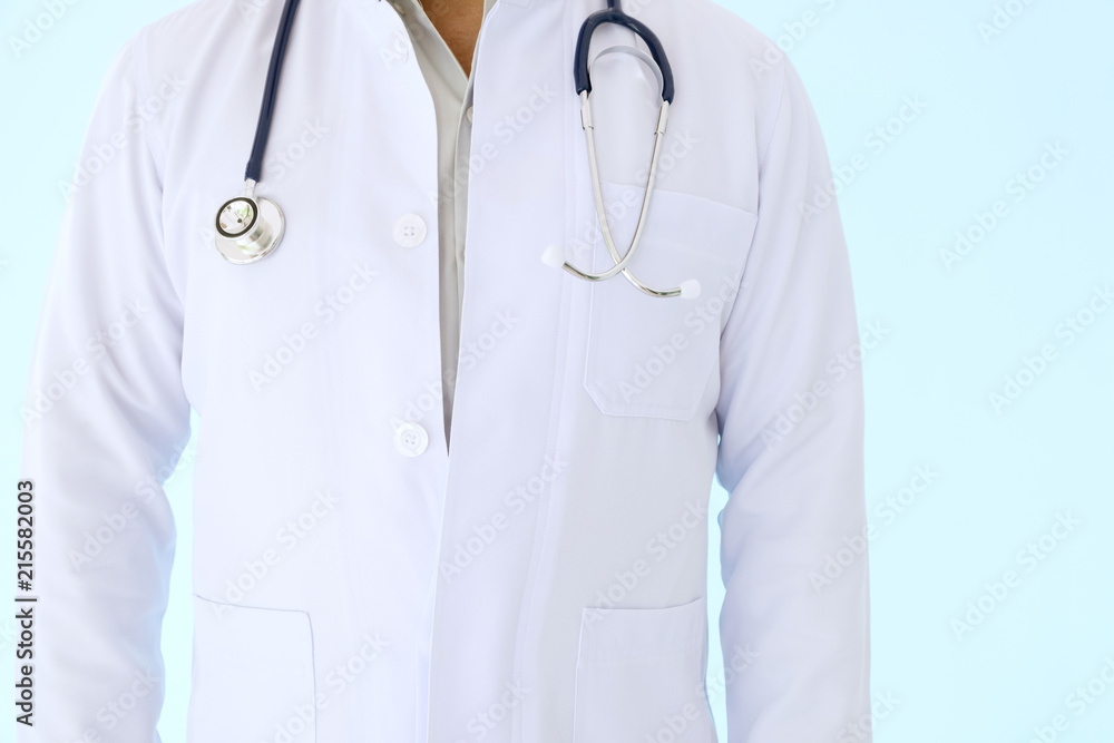 Doctor in white gown uniform with stethoscope in a hospitsl. Doctor in white gown uniform with stethoscope in a hospitsl.