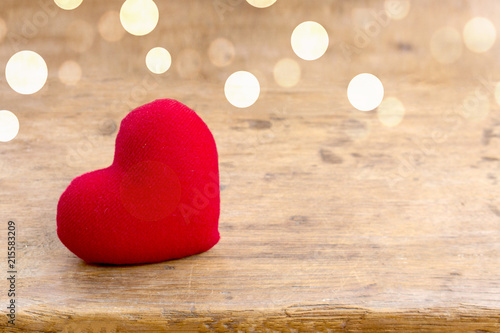 Red Heart of Truly love concept on rustic wooden table with light bokeh and copy space. Valentine day, wedding celebration. You and Me love forever concept. 