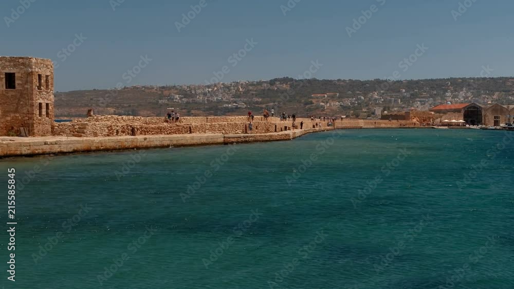 Establishing shot of the coastline, the shipyards the Old Town of Chania, Crete, Greece Establishing shot of the coastline, the shipyards the Old Town of Chania, Crete, Greece