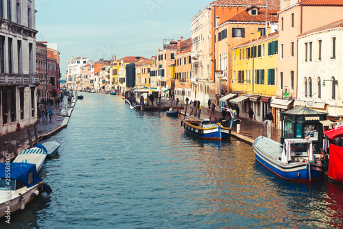 Venetian channel with ancient houses and boats