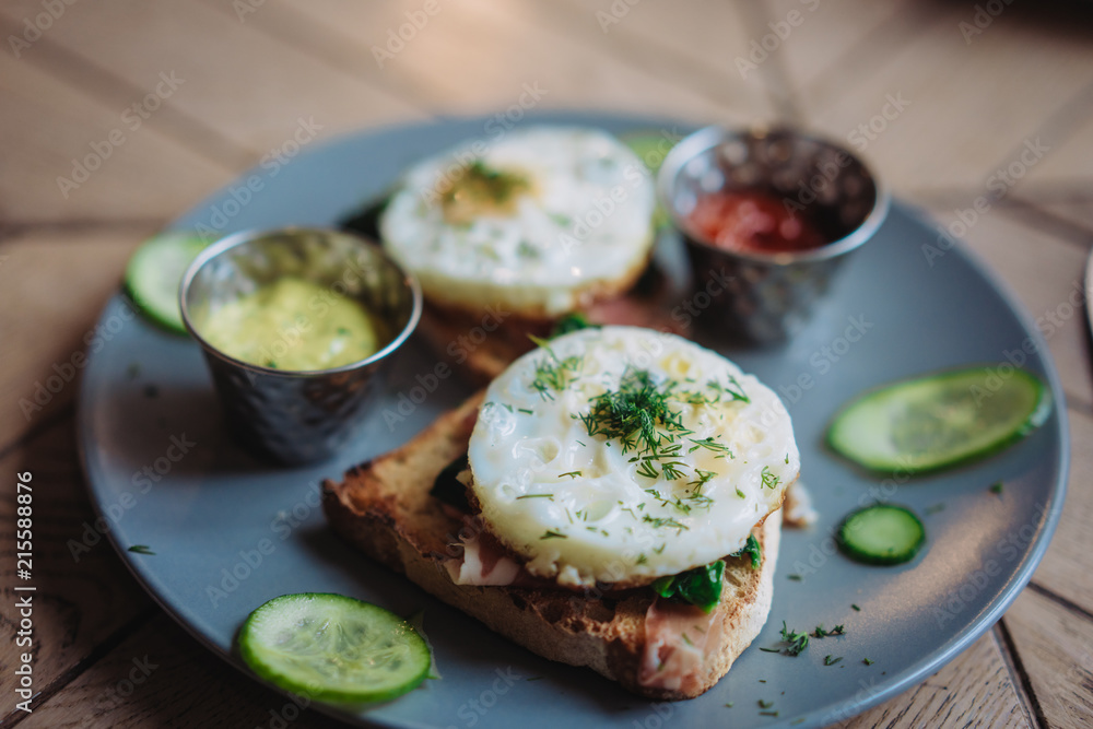 Plate with morning breakfast on the table