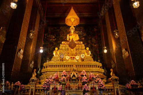 Wat Pho or Wat Phra Chetuphon buddhist temple . golden buddha statue sitting . old historic architecture in Bangkok Thailand , asian travel landmark © Rattanachai