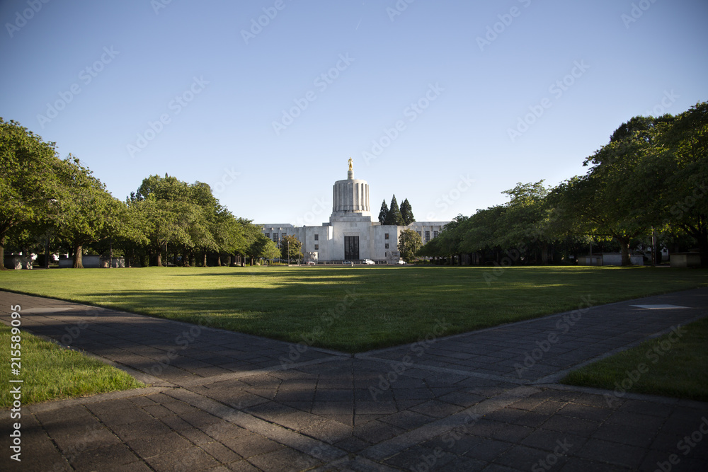 Distant view of the Oregon State Capitol and promenade with clear blue sky
