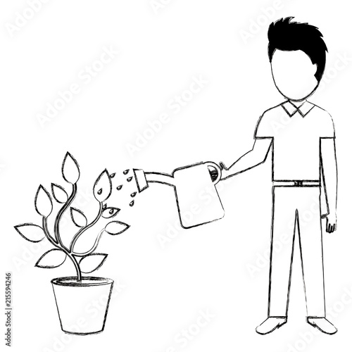 man cultivating plant with watering pot