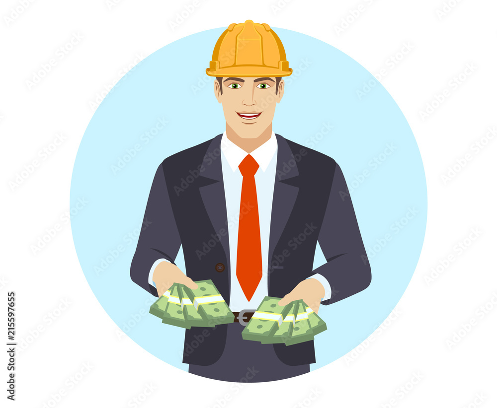 Businessman in construction helmet holding money Businessman in construction helmet holding money
