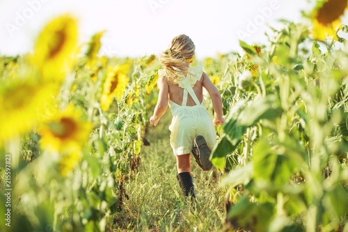 Child in sunflowers 