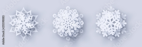 Vector set of 3 white Christmas paper cut 3d snowflakes with shadow on white background. New year and Christmas design elements