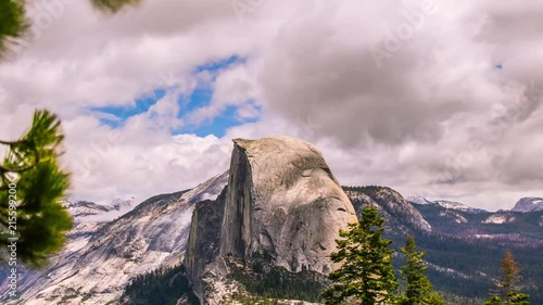 Timelapse - Beautiful Clouds Moving over Half Dome at Yosemite -  4K photo