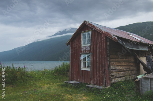 Old rustic buildings in coastal Norway in fishing village photo
