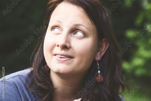 Portrait on young happy brunette