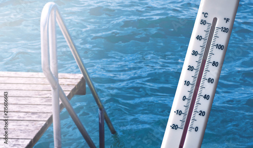 Watertemperature in a swimming pool outside on a hot summer day- hotelpool photo