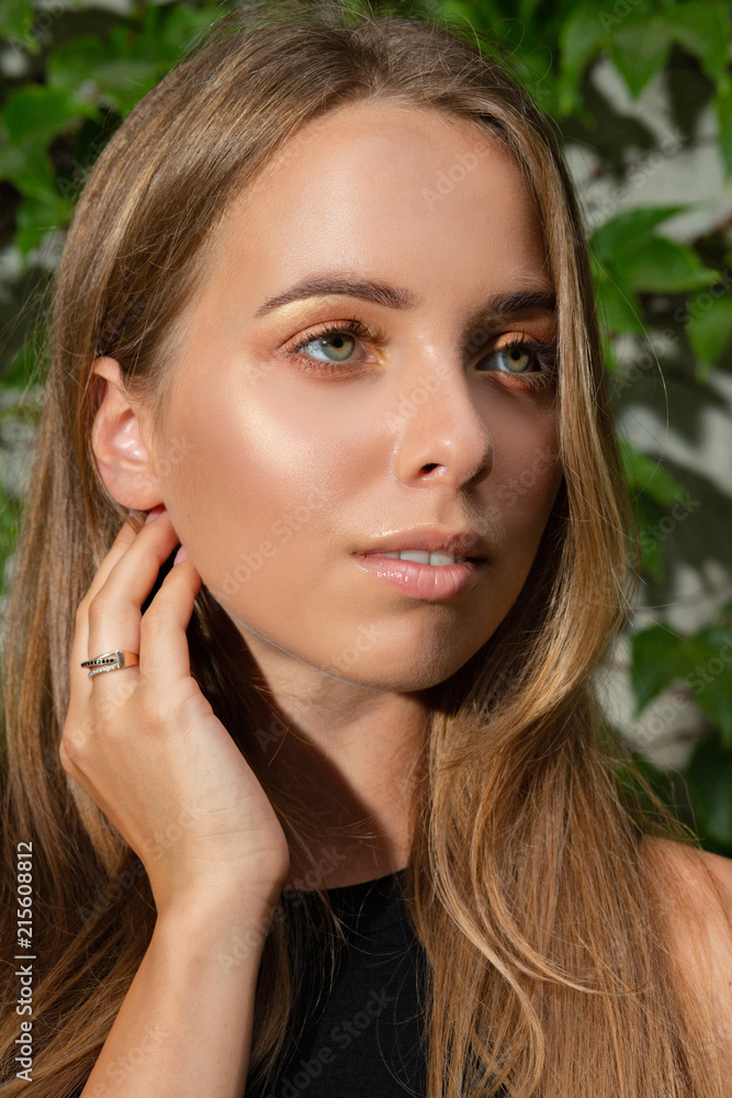 Closeup portrait of attractive blonde girl with natural professional makeup Closeup portrait of attractive blonde girl with natural professional makeup