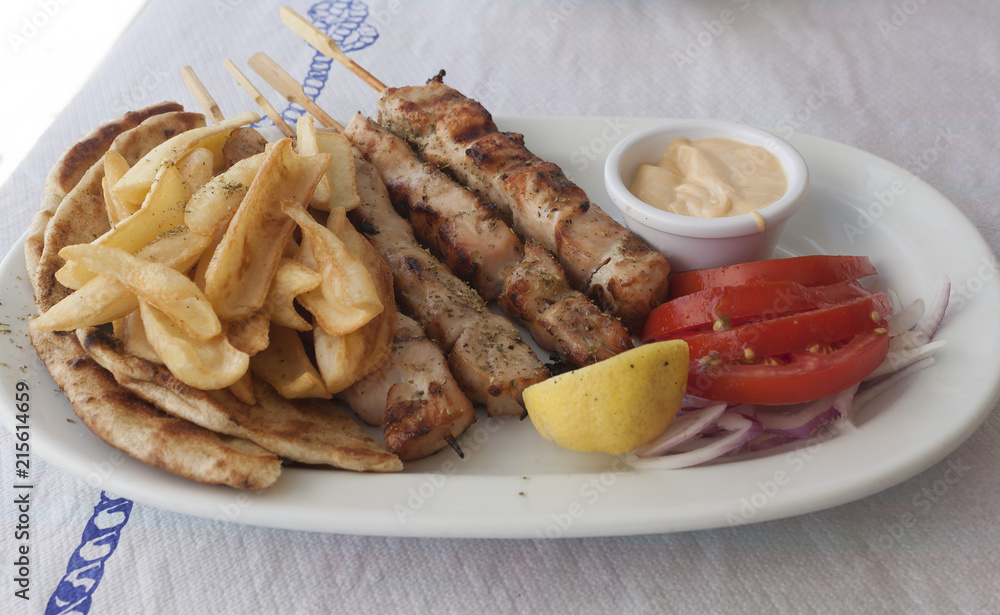 Traditional Greek food. Portion of souvlaki