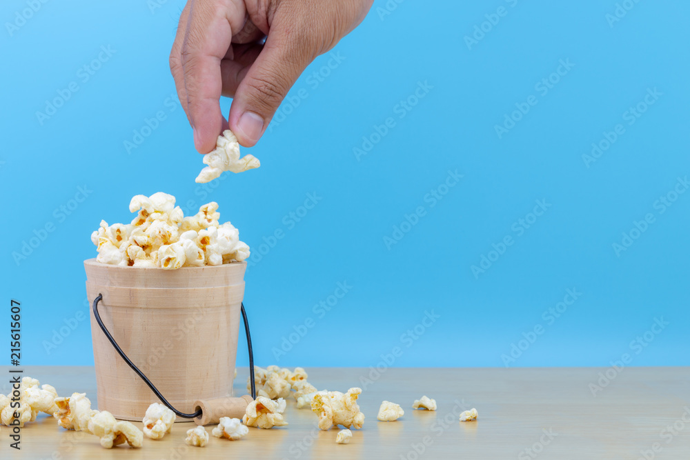 hand picked popcorn in wood bowl hand picked popcorn in wood bowl