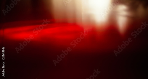 Blurred Glass of red wine close-up