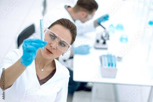 scientists chemists working in the laboratory