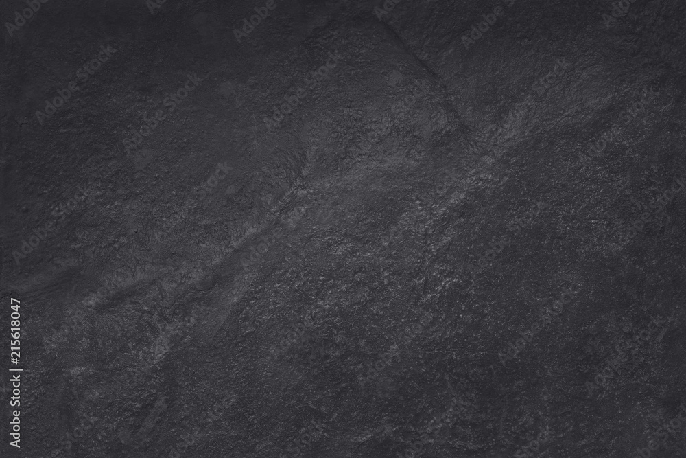 Fototapeta premium Dark grey black slate texture in natural pattern with high resolution for background and design art work. Black stone wall.