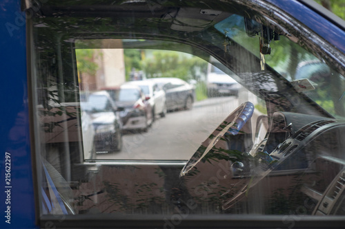 View through the window of the car on the interior and street