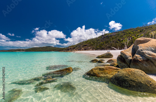 Rocks on Whitehaven Beach with white sand in the Whitsunday Islands, Queensland, Australia