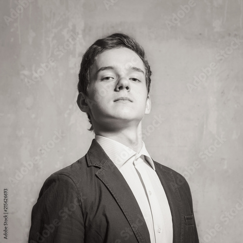 Studio portrait of a teenager boy.Emotions of a person, arrogance