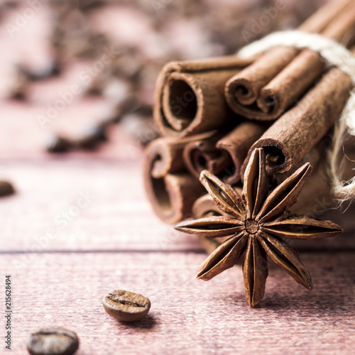 Cinnamon sticks Anise star and Coffee beans close up Selective focus