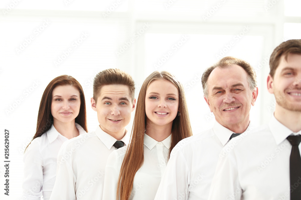 close up. a successful group of employees standing in a row close up. a successful group of employees standing in a row