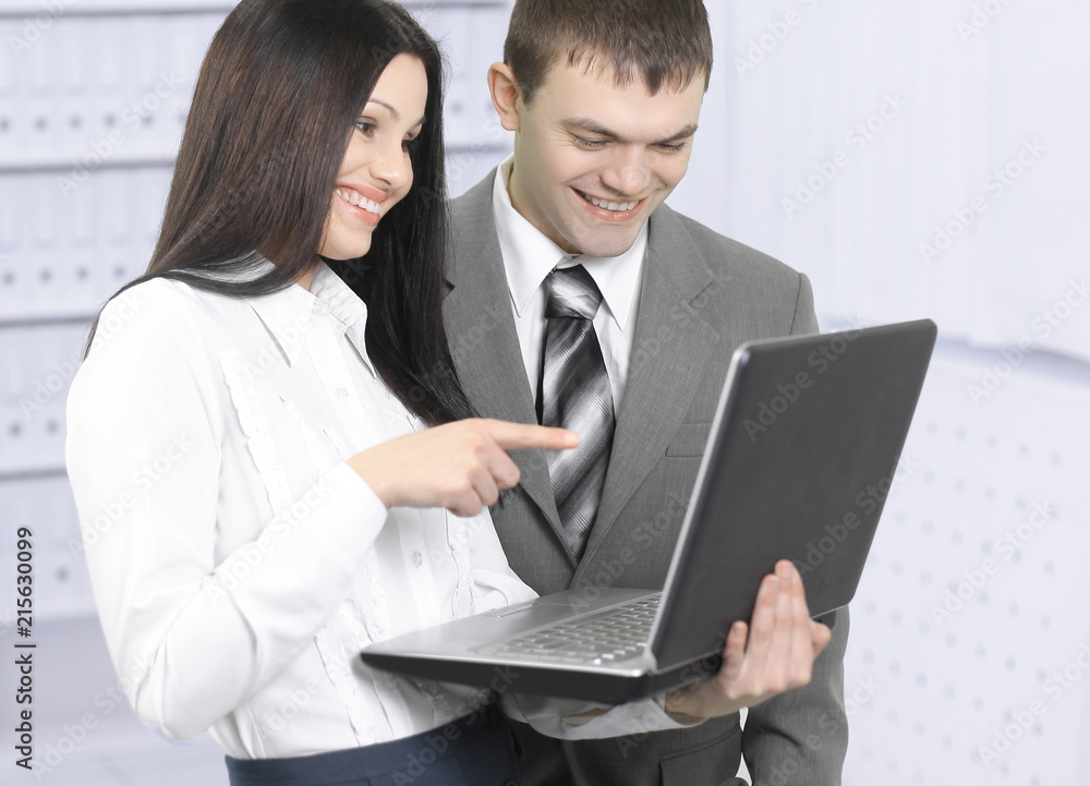 employees communicating on the Internet using laptop. employees communicating on the Internet using laptop.