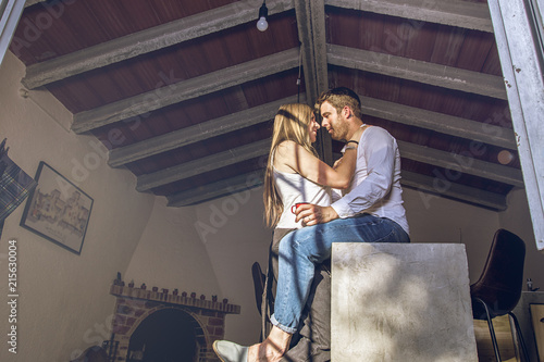 Couple of guy and girl looking at each other in love and about to kiss