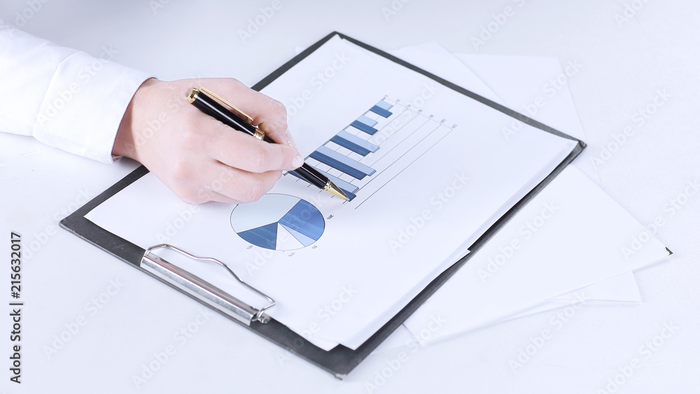 closeup.business woman checking marketing graphics. closeup.business woman checking marketing graphics.