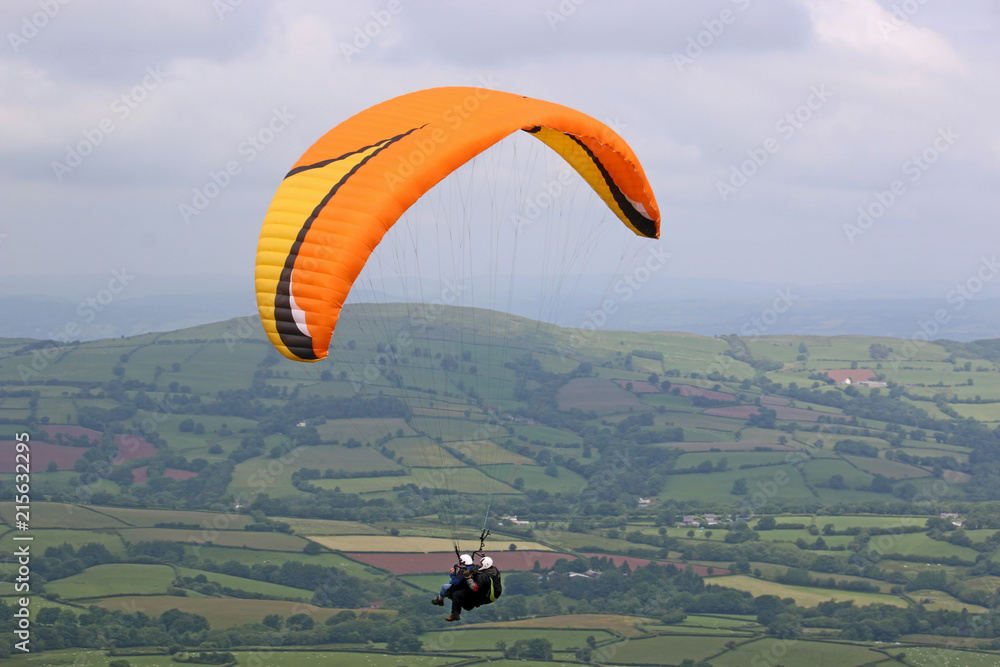 Tandem paraglider in the Brecon Beacons Tandem paraglider in the Brecon Beacons