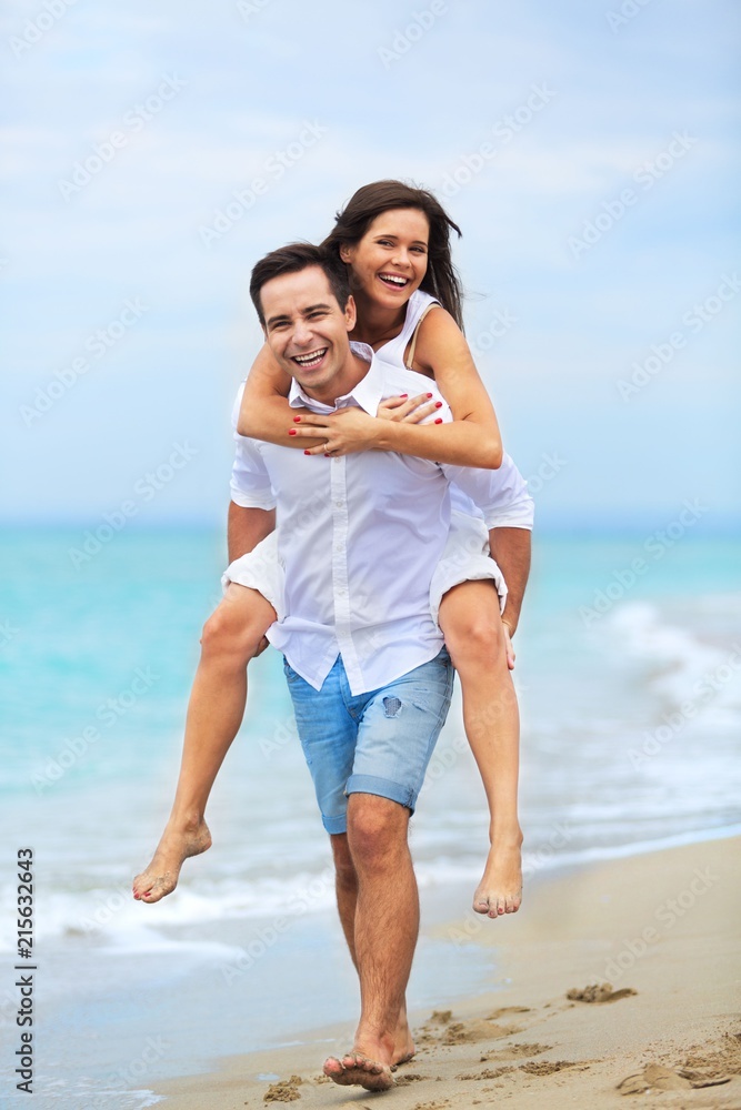 Portrait of a Couple Having Fun at the Beach Portrait of a Couple Having Fun at the Beach