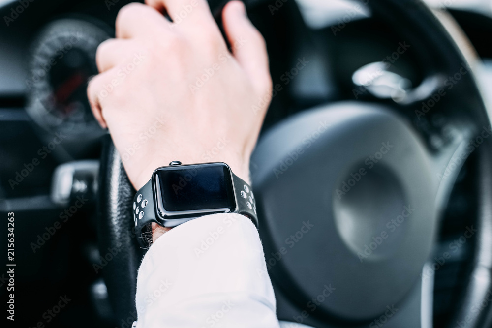 smart watch from the driver of the car.