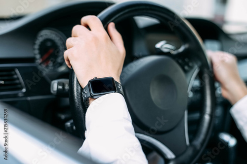 smart watch from the driver of the car. © velimir