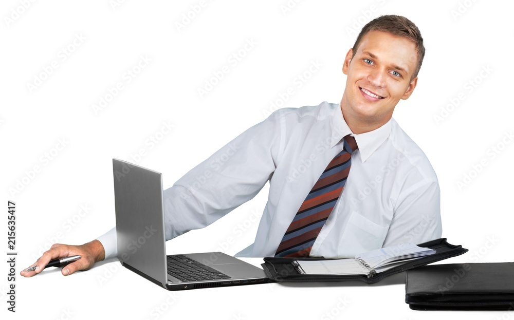 Portrait of a Confident Businessman Working with Laptop Portrait of a Confident Businessman Working with Laptop