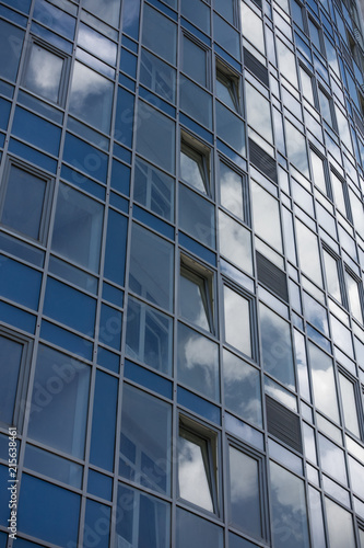 Architectural exterior detail of industrial office building with cloud