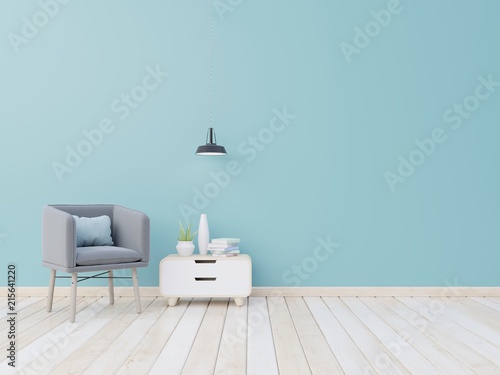 Interior mock up with armchair,pillow and cabinet in living room with empty blue wall. 3D rendering.