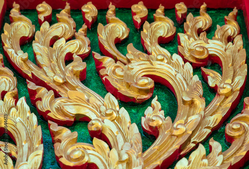 Wallpaper Mural The sculpture carved of temple wall with beautiful golden pattern.The monastery is architecture of religious importance and public place for general people either Thai and foreign visitors. Torontodigital.ca