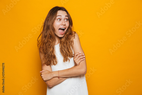 Portrait of a shocked young girl looking away