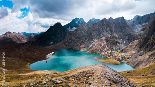 The breathtaking view of Krishansar lake in dry season under a cloudy weather from Gadsar Pass (4,080m), Kashmir The Great Lakes Trek, India photo
